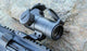 Viseur Point Rouge Sightmark posé sur le sol